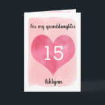 Pretty Pink Heart 15th Birthday Granddaughter Kaart<br><div class="desc">A pink 15th birthday granddaughter card, which features a watercolor heart against pink watercolor. You can personalize the heart with the age you need and add her name underneath the heart. The inside message can be easily edited if wanted. The back of the card has a smaller version of the...</div>