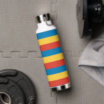 Primaire kleurenstreepjes waterfles<br><div class="desc">Deze eenvoudige maar vette strepen in de primaire kleuren blauw, geel en rood voegen een aanraking van helderheid aan het dagelijkse leven toe.</div>