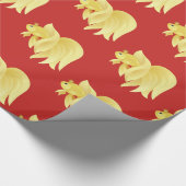 Prinses gouden vis op rood cadeaupapier (Hoek)