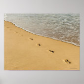 Prints in zand met golven (Voorkant)