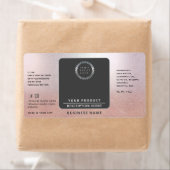 Professionele logo omwikkelen rond roos goudproduc etiket (Insitu)