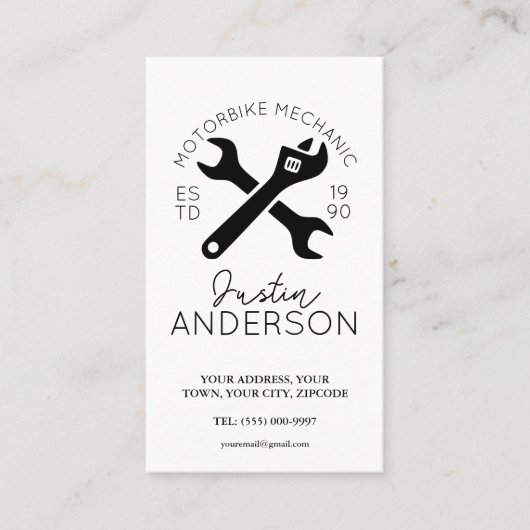 Professionele monteur met moersleutel en sleutel visitekaartje (Voorkant)