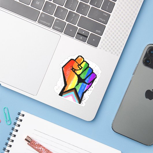 Progress Pride Vuist Sticker (Laptop met iPhone)