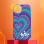 Psychedelic Hearts Calligraphy Script Name Paars iPhone 16 Hoesje<br><div class="desc">Een funky hartpatroon met gekke paarse en blauwe kleuren. Het moderne script met swashes voegt een moderne aanraking toe aan dit retrodesign. Voeg jouw naam toe of schrap de tekst voor een leuke vrouwelijke dekking.</div>