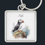 Puffin op een Rock Waterverf, op maat Sleutelhanger<br><div class="desc">Draag een klein stukje kunst bij je waar je ook gaat met deze aangepaste waterverf papegaaiduiker sleutelhanger. Dit unieke accessoire is voorzien van het elegante ontwerp van de papegaaiduiker en biedt een stijlvolle en persoonlijke touch aan uw sleutels, tas of rugzak. De levendige kunst is gedrukt op duurzaam materiaal, waardoor...</div>