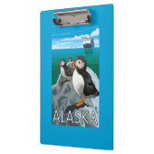 Puffins kijken naar een cruiseschip klembord (Links)