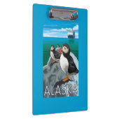 Puffins kijken naar een cruiseschip klembord (Rechts)