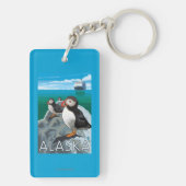 Puffins kijken naar een cruiseschip sleutelhanger (achterkant)