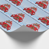 Pug-hond in auto met kerstman  cadeaupapier (Hoek)