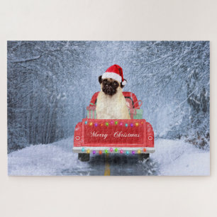 Pug-hond in de sneeuw zittend in Kersttruck Legpuzzel