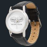 Punk Rock Tattoo Hands True Love 42e Jubileum Horloge<br><div class="desc">Voeg je namen toe aan creëer een gepersonaliseerd verjaardagscadeau. Dit horloge kenmerkt eenvoudig grafisch in zwart met twee vuist met "DE VERLIES VAN DE WAAR"die in de letters van het tattoo op de vingers met uw namen (of andere tekst) hieronder in de doopvont van de schrijfstijl van de typemachine worden...</div>