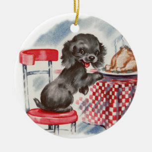 pup aan tafel keramisch ornament