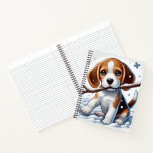Puppy speelt in de sneeuw met een stok in de winte notitieboek