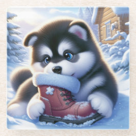 Puppy spelen met een besneeuwde winterschoen glazen onderzetter