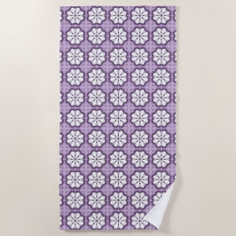 Purple and white floral patterned strandlaken