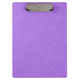 Purple textured surface with swirling pattern klembord