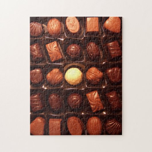 Puzzel die doos van chocoladesnoep kenmerken legpuzzel (Verticaal)