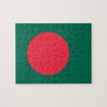 Puzzel met de vlag van Bangladesh<br><div class="desc">Vier nationale trots en test je vaardigheden met onze unieke puzzel met de vlag van Bangladesh! Ontworpen met zorg en culturele waardering, toont deze puzzel prachtig de iconische groene en rode vlag van Bangladesh. Terwijl je het samenstelt, geniet je van een leuke en lonende activiteit die ook je verbinding met...</div>