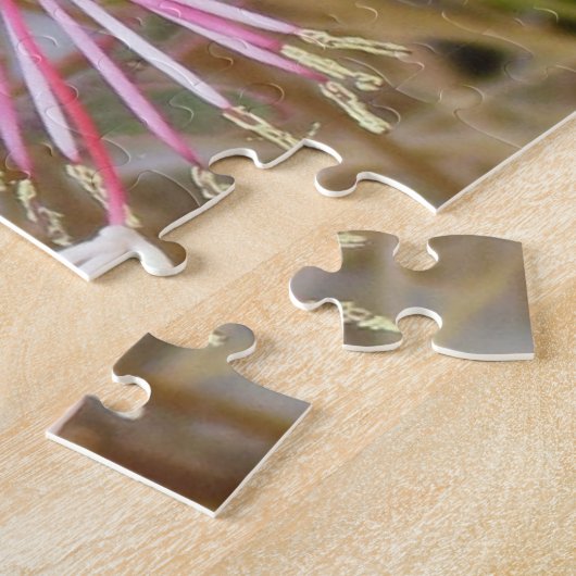 Puzzel - Roze bloemen in gedroogd gras Legpuzzel (Zijkant)