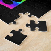 puzzelen op een regenboog legpuzzel (Zijkant)