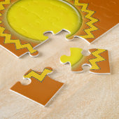 Puzzelzweefcirkels met gele wereldbollen legpuzzel (Zijkant)