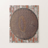 Puzzle - Hoesje in mangat op brick Legpuzzel (Verticaal)