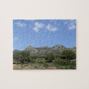 Puzzle in berglandschap legpuzzel