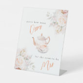 Raad eens hoeveel kussen pastel bloeit douchespel reclamebord met voetstuk (Voorkant)