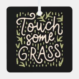 Raak wat gras zwart en groen aan metalen ornament