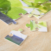 Raccoon in een boom legpuzzel (Zijkant)