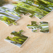 Raccoon zwemmen in rivierwater legpuzzel (Zijkant)