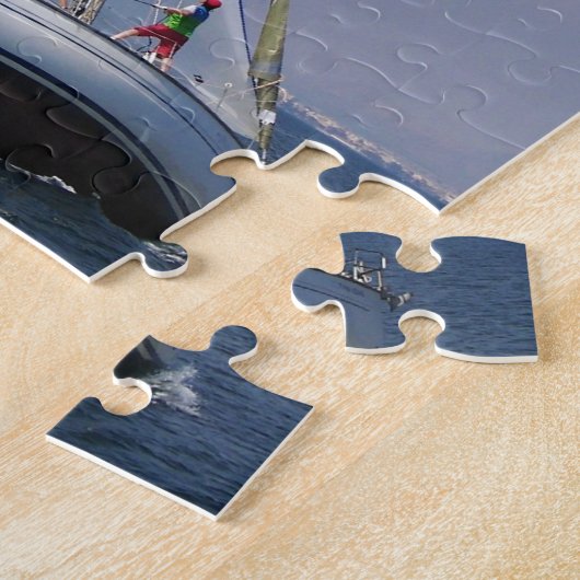 Racend jacht van achteren. legpuzzel (Zijkant)