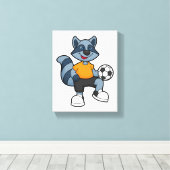 Racoon als voetbalspeler met Voetbal Canvas Afdruk (Insitu (Houten vloer))