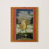 Radha en Krishna omhelzen in een geïdealiseerd lan Legpuzzel (Verticaal)