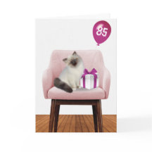 Ragdoll-kat met 85e jaarballon