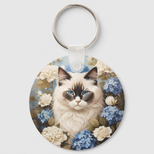 Ragdoll kat met blauwe hortensia bloemen sleutelhanger