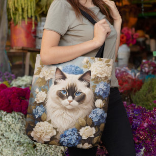 Ragdoll kat met blauwe hortensia bloemen tote bag