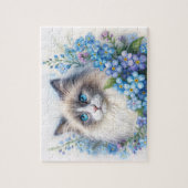 Ragdoll kat tussen vergeet-mij-nietjes legpuzzel (Verticaal)