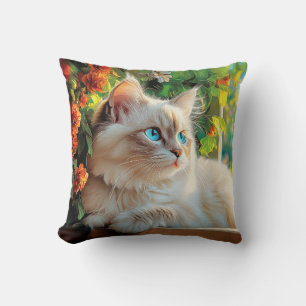 Ragdoll kattenportret met bloemen kussen