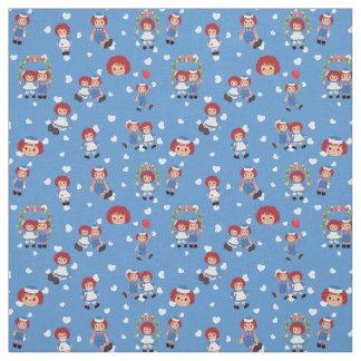 Raggedy Ann en Andy op vallende harten op blauw Stof