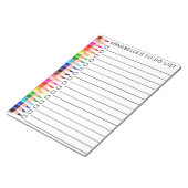 Rainbooggekleurde pennen om lijst aan te passen notitieblok (Schuin)