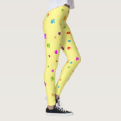 Rainboogkleurig autisme puzzelstukjes op geellow leggings (Rechts)