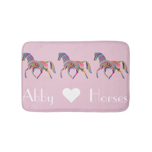 Rainboogpaarden op roze badmat (Voorkant)