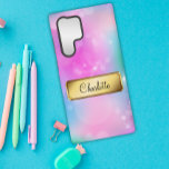 Rainbow Blue en Pink Bokeh Samsung Galaxy Hoesje<br><div class="desc">Voeg een vleugje persoonlijkheid toe aan uw telefoon met onze gepersonaliseerde Rainbow Blue en Pink Bokeh telefoonhoes. Dit hoesje heeft een prachtig pastelroze, blauw en groen bokeh-patroon met witte sprankjes en een gouden badge die kan worden gepersonaliseerd met jouw naam (of monogram, als je wilt). Het hoesje is gemaakt van...</div>