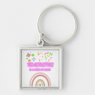Rainbow Teaching is een werk van hart Sleutelhanger
