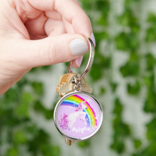Rainbow unicorn-springmeisjes sleutelhanger