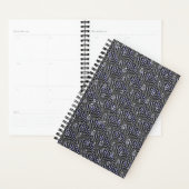 Raindrops op blauwe grijze metalen planner (Display)