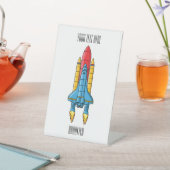 Raketscheepsillustratie cartoon reclamebord met voetstuk (Insitu)