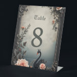 Rare as a black swan, timeless as true love.  reclamebord met voetstuk<br><div class="desc">Rare as a black swan, timeless as true love. In a quiet moment beside still waters, the Royal Swan appears — crowned in grace and surrounded by delicate roses. A symbol of rare beauty and enduring devotion, the black swan represents a love that stands apart from all others. Framed by...</div>