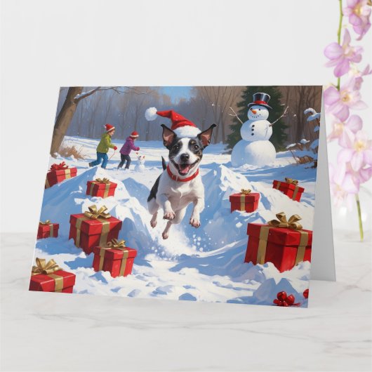 Rat Terrier rent in de sneeuw met kerstmuts Kaart (Orchidee)